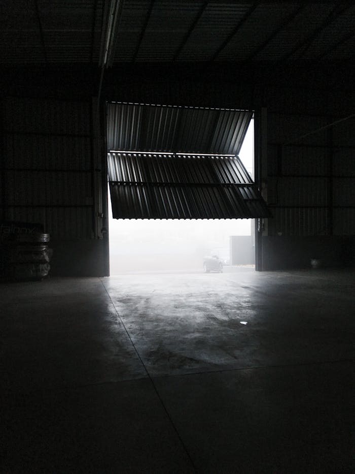 Inside of spacious garage with metal panels
